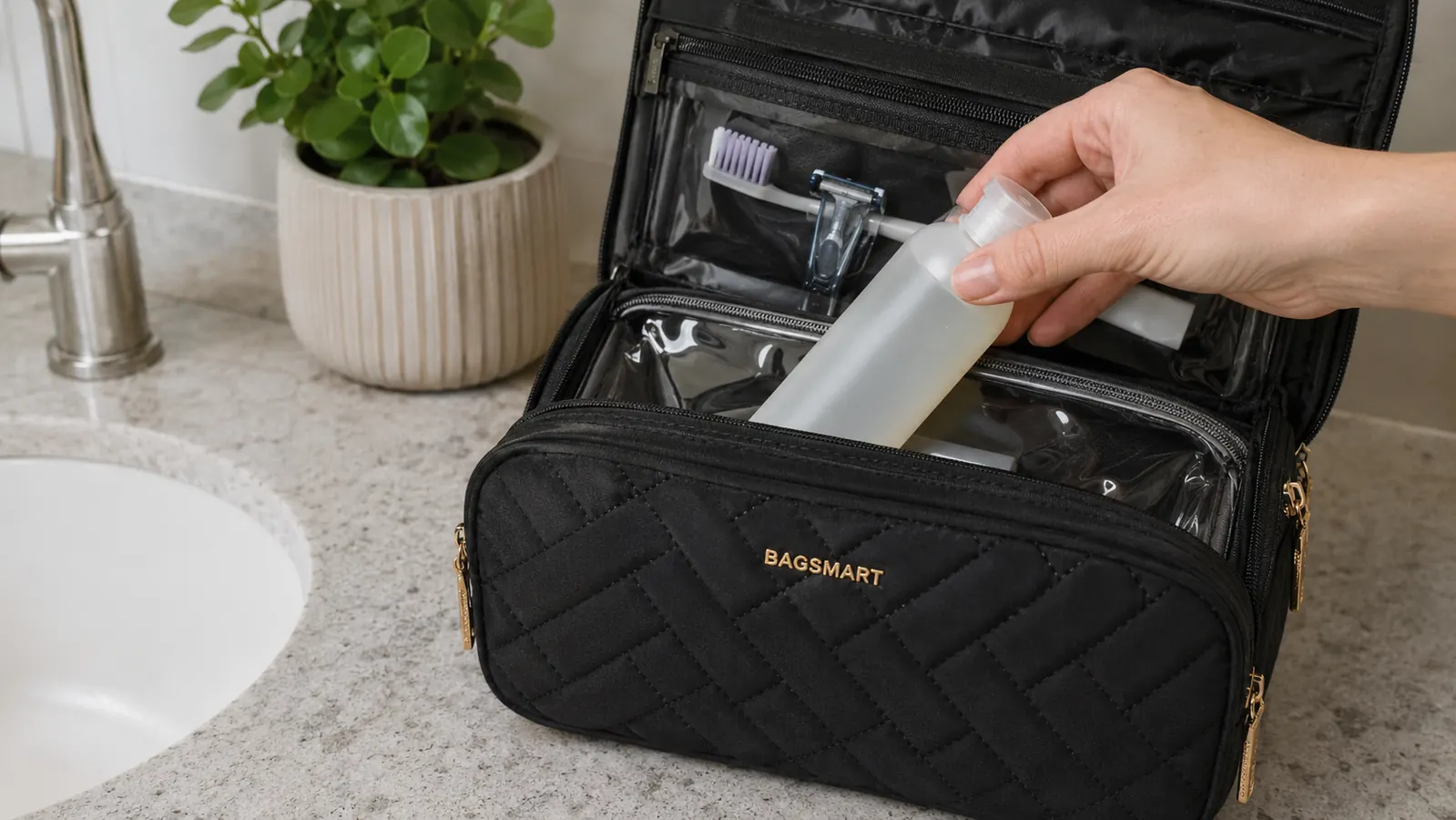Hand placing 3.4 ounce travel bottles into the clear TSA-approved pouch of a hanging toiletry bag